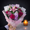 Mixed flower bouquet 15 - pink lily, magenta carnations and lavender stock wrapped in blush pink tissue paper