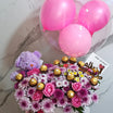 Pink flower arrangement with balloons teddy bear and chocolates