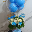 Blue and white baby boy flower arrangement with balloons