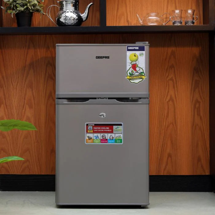 Geepas GRF1259GPE 84L Double Door Defrost Refrigerator – Rapid Cooling | Tempered Glass Shelves | CFC-Free