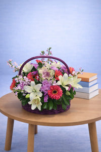 Mixed Flower Basket 20 – White Lily, Gerbera & Stock in Purple Wicker