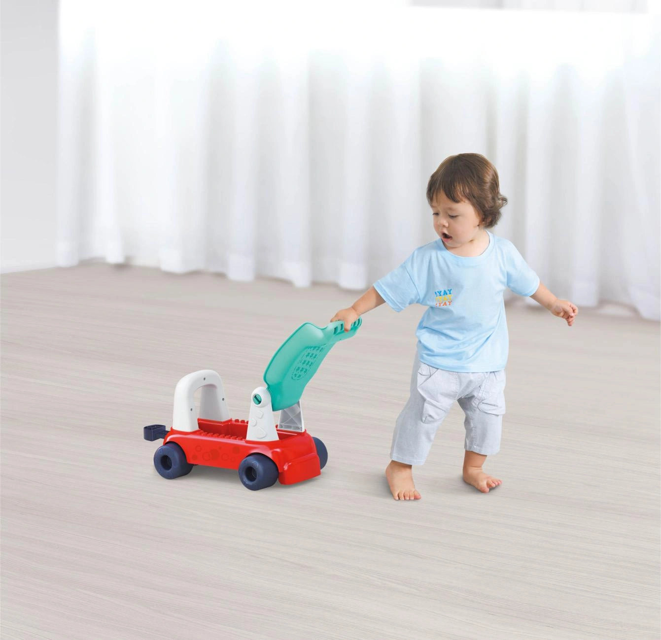 HOLA – 4-in-1 Push Walker & Ride-on Learning Train